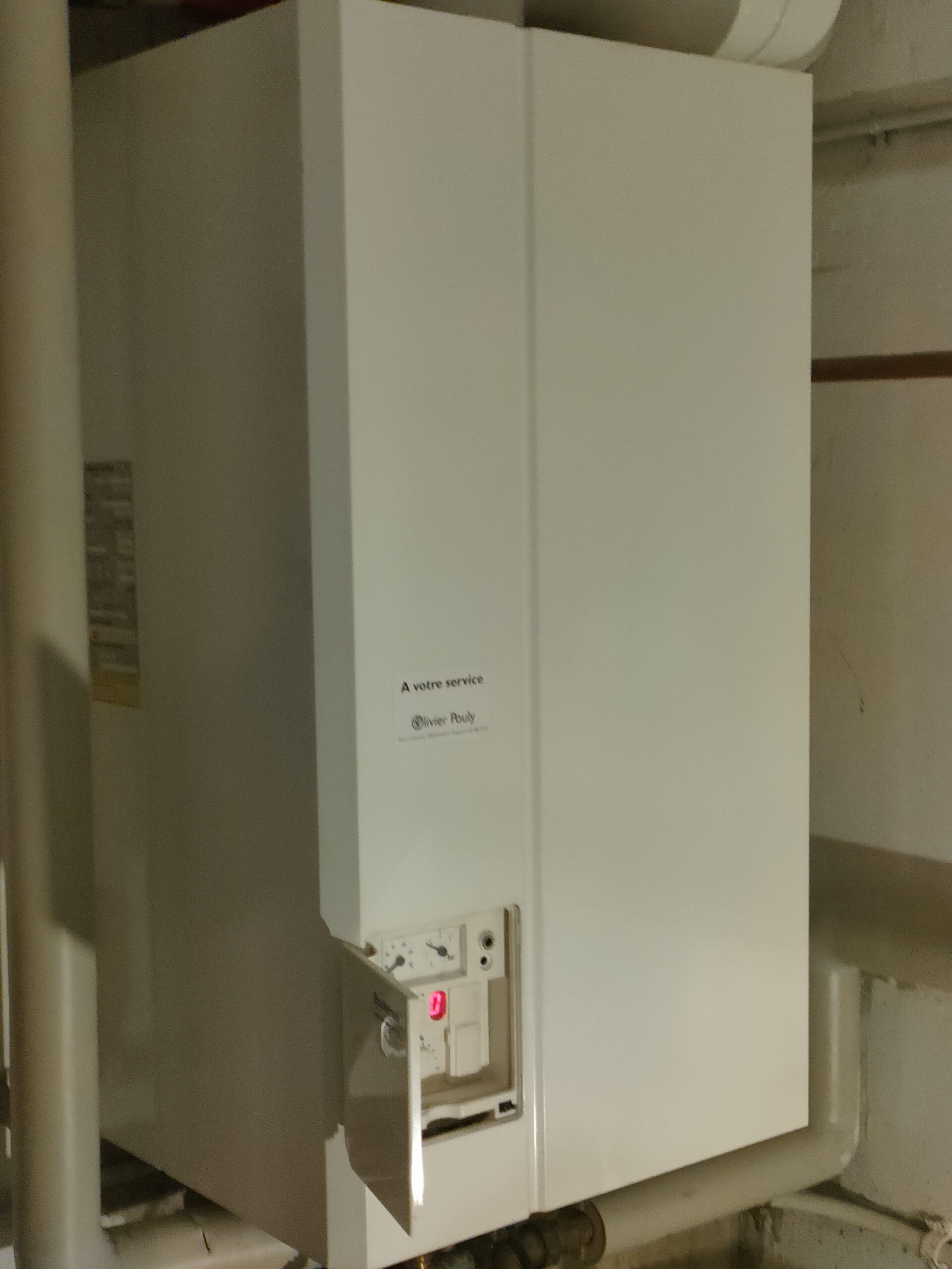 Installation de chauffage photographiée avant les travaux dans le dossier à Échallens